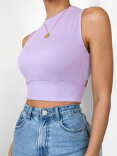 Top liso con lazo, espalda descubierta y corte entallado